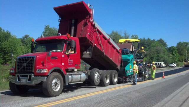 Perry Transport Inc truck hauling equipment